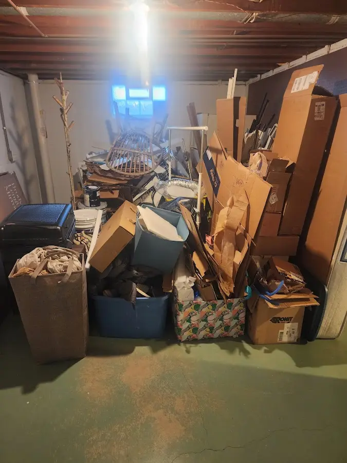 Roll-off dumpster container at job site for Construction Dumpster Rental in Hope